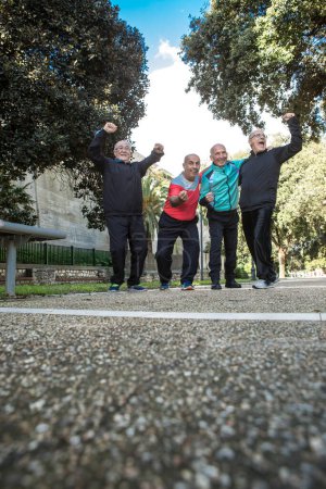 Photo for Group of happy senior men doing sport at park - Royalty Free Image