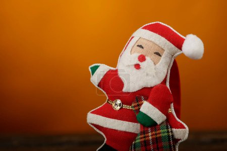 Photo for Santa claus toy on a dark background - Royalty Free Image