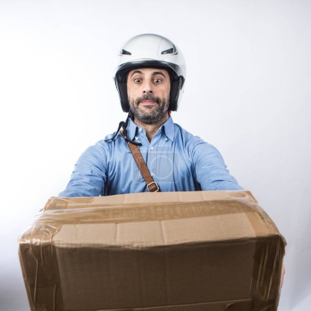 Photo for Delivery man in helmet isolated on gray background - Royalty Free Image