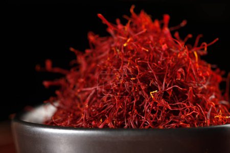 close up view of delicious saffron spice in bowl