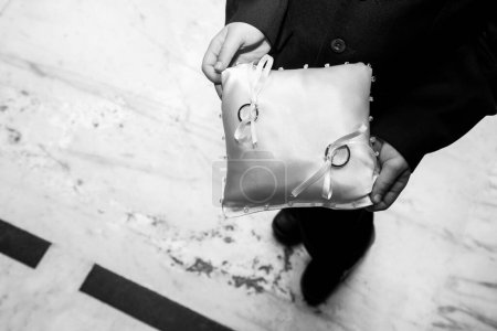 Photo for Wedding rings carried by pillow - Royalty Free Image