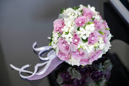 Photo for Beautiful bouquet of flowers ready for a bride on her wedding day - Royalty Free Image