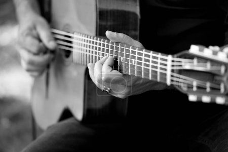 Photo for Close up of man playing the guitar - Royalty Free Image