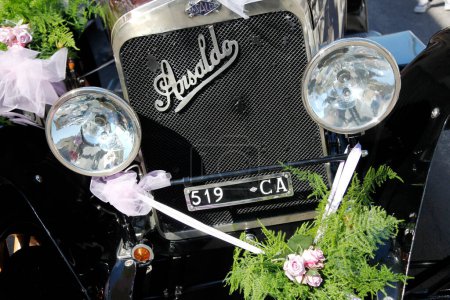 Photo for Close-up view of vintage car and wedding decorations - Royalty Free Image