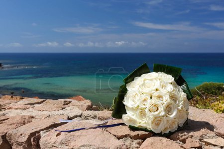 Téléchargez les photos : Bouquet de mariage sur la plage - en image libre de droit