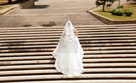 Photo for Bride in a white dress with a veil - Royalty Free Image