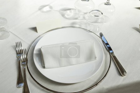 Photo for White table set in the restaurant - Royalty Free Image