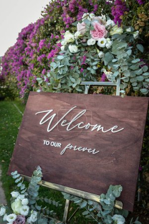 Photo for Welcome to wedding ceremony in the garden - Royalty Free Image