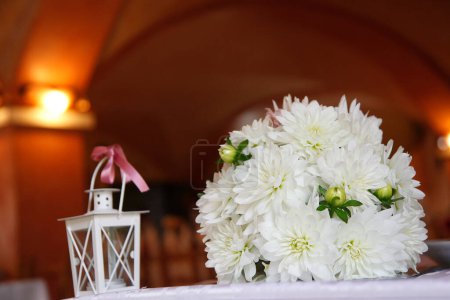 Photo for Beautiful bouquet of white flowers on the table for a wedding reception. - Royalty Free Image