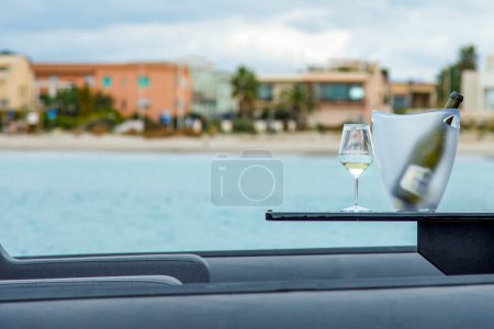 Photo for Champagne glasses on a car. - Royalty Free Image