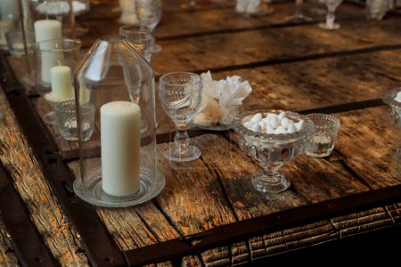 Photo for Old vintage table in a rustic style in a restaurant. - Royalty Free Image