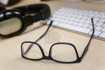 Photo for Close up of glasses with a tablet computer - Royalty Free Image