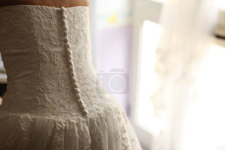 Téléchargez les photos : Gros plan d'une robe de mariée détails - en image libre de droit