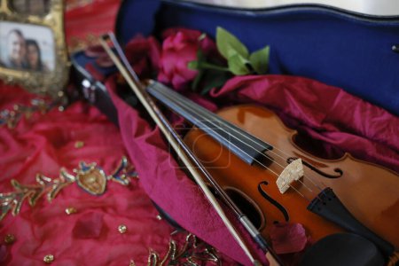 Photo for Violin and red bow of a music - Royalty Free Image