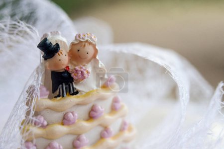 Photo for Wedding couple decor on wedding cake. - Royalty Free Image