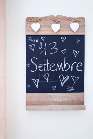 Photo for The word september on a wooden background - Royalty Free Image