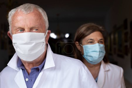 Photo for Doctor and assistant with masks - Royalty Free Image