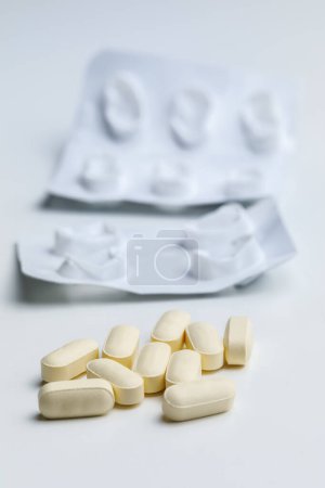 Photo for White pills, tablets, capsules on light background, closeup. health care concept. - Royalty Free Image