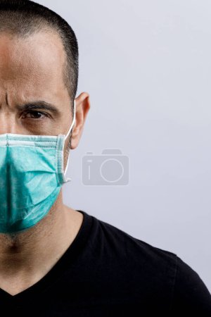 Photo for Man with green mask - Coronavirus - Royalty Free Image