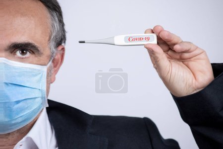 Photo for Portrait of man wearing a surgical mask, jacket and shirt, isolated on background - Royalty Free Image