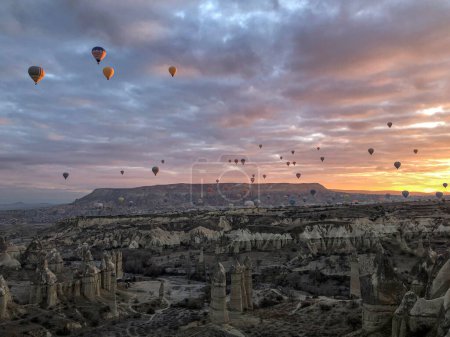 Photo for Hot air balloon flying over cappadocia - Royalty Free Image