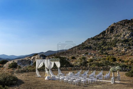 Photo for Beautiful wedding ceremony with white flowers on the beach - Royalty Free Image