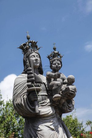 Photo for Statue of a woman and baby with a crowns - Royalty Free Image