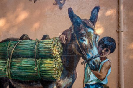 Téléchargez les photos : San Nicol D'Arcidano - Belle murale dans le centre historique représente des scènes de la vie quotidienne du passé - en image libre de droit