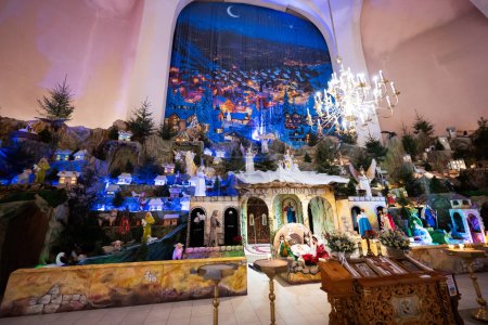 Foto de Christmas nativity crib scene in church. - Imagen libre de derechos