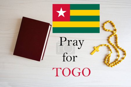 Photo for Pray for Togo. Rosary and Holy Bible background. - Royalty Free Image
