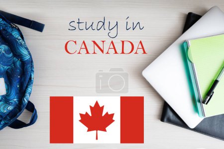 Study in Canada. Background with notepad, laptop and backpack. Education concept.