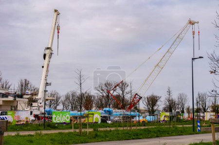 Photo for Toulouse, France -  March 2020 - Work machines at the construction site of the Oncopole Terminus of the future Tlo, soon the longest France's urban cablecar manufactured by Poma and operated by Tisseo - Royalty Free Image