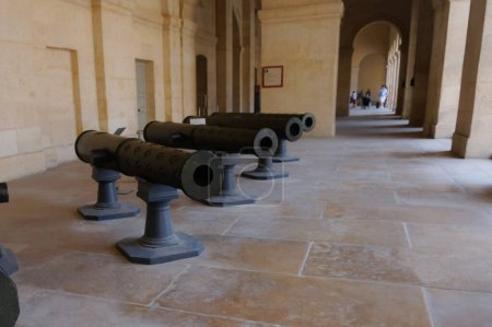 Photo for Paris, France - Bronze old cannon, put on metal support and exhobited for the public - Royalty Free Image