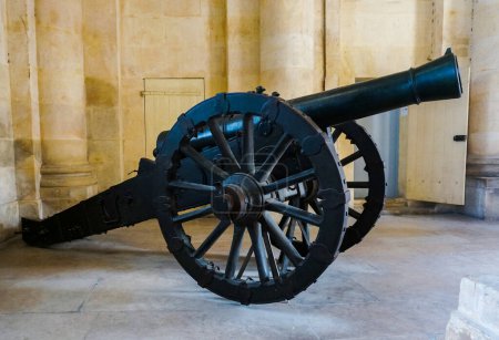 Photo for Paris, France - Wheeled bronze old cannon, with the gun carriage and the gun barrel - Royalty Free Image