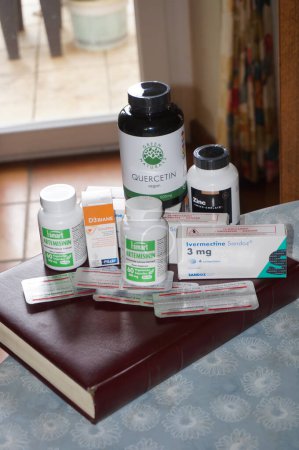Photo for Tarn, France - July 2021 - Some of the dietary supplements and medicines recommended for Covid-19 prophylaxis or early treatment : antiparasitic ivermectin, vitamin B3, zinc and artemisinin. - Royalty Free Image