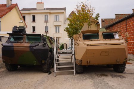 Photo for Troyes, France - Sept. 2020 - Two retired VABs side by side, in forest and desert camouflage ; these armored personnel carriers were developped by Renault Trucks Defense (Arquus) for the French Army - Royalty Free Image