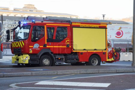 Photo for Toulouse, France - Feb. 2023 - A Renault Master transformed into an ambulance with the rescue and fire center; the red and yellow vehicle is marked with the "112" - Royalty Free Image
