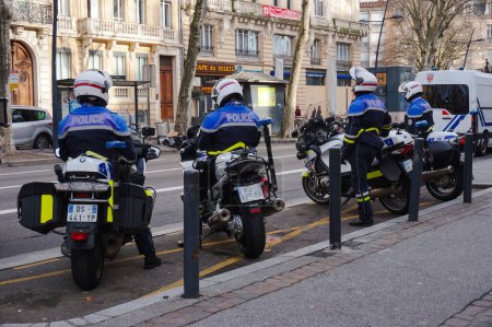 Photo for Jean-Jaurs, Toulouse, France - Feb. 2020 - Two motorcyclists of a CRS unit of the French National Police, riding BMW motorbikes - Royalty Free Image