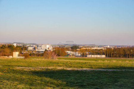 Photo for Reims, France - March 2021 - Fallow fields by Rouliers Road in Moulin de la Housse neighborhood ; on the left, in the background, the DGAC's regional Air Traffic Control Center (CRNA) of Reims - Royalty Free Image