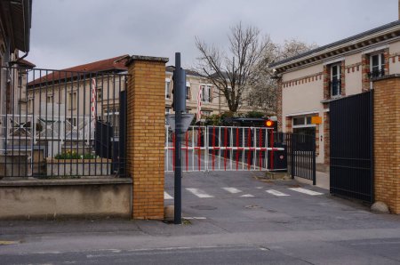 Photo for Reims, France - March 2021 - Gate at the entrance of the industria facilities, on Thomas Street, of the world-renowned French Champagne producer Veuve Clicquot Ponsardin, a brand of the LVMH Group - Royalty Free Image