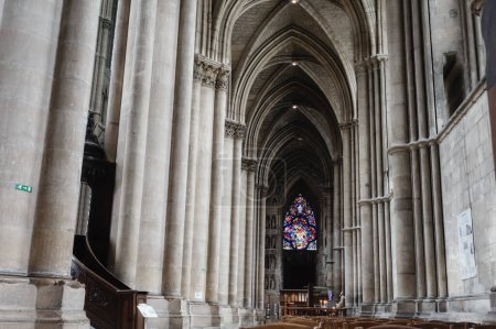 Photo for Reims, France - June 2022 - Seen from inside Notre-Dame Cathedral, the two rose windows and the stained glass windows of the clerestory ; the Gothic Cathedral is a UNESCO World Heritage Site - Royalty Free Image