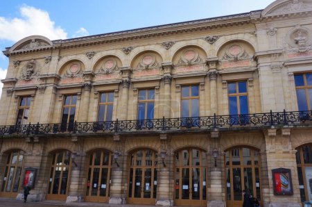 Photo for Reims, France - March 2021 - Neoclassical facade of the city's 19th century Opera House, on Rue de Vesle, featuring a balcony with a wrought-iron baluster, and wooden arched doors by the curbside - Royalty Free Image