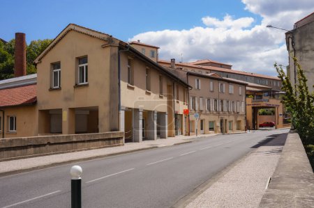 Photo for Castres, France - Aug. 2020 - Traditional, old houses by a sloping street in the town centre of Castres, the largest town of the Sidobre and of the Black Mountain, in the South of Tarn Department - Royalty Free Image