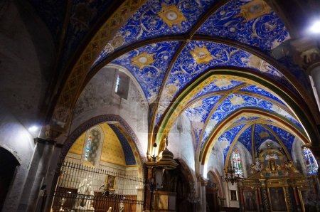 Photo for Puycelsi, France - Dec. 2018 - Remarkable painted ceiling in the vaulted interior of the Southern gothic church of Saint-Corneille, executed by the same Italian artists who decorated Albi Cathedral - Royalty Free Image