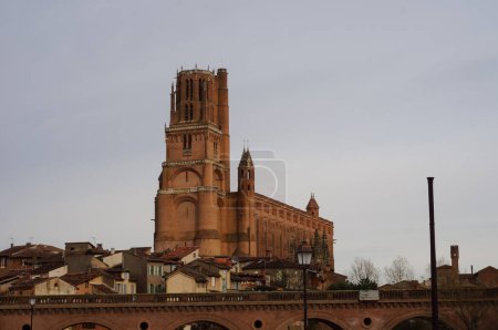 Photo for Low angle view of the 78-meter high bell tower of the medieval Sainte-Ccile's Cathedral in Albi, France ; this gothic UNESCO World Heritage Site is the largest brick-built building worlwide - Royalty Free Image