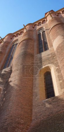 Photo for Albi, France - Aug. 2021 - Exterior facade of Palace of the Berbie, on Quai Choiseul ; the castle, now a museum, was a former episcopal residence and is located within a UNESCO World Heritage Site - Royalty Free Image