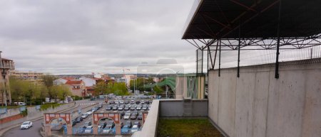 Photo for Toulouse, France -Sept. 2019- Parking lot full of cars of the multimodal hub of Jolimont, seen from the overground metro station, at the end of the viaduct that supports the elevated railway section - Royalty Free Image