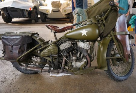 Photo for Troyes, France - Sept. 2020 - Side view of an old, vintage 1942 Harley-Davidson WLA (V2), a powerful motorbike used by the US Army during World War 2, featured with a case to carry a combat rifle - Royalty Free Image