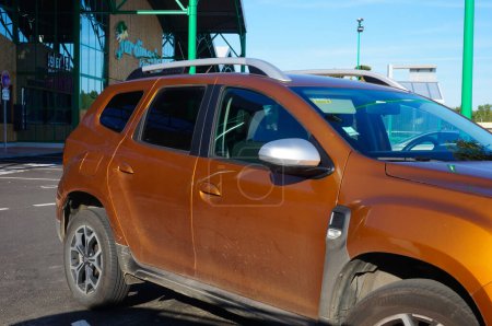 Photo for Albi, France - Juy 2022 - 2017 metallic orange Duster, Dacia Renault - Royalty Free Image