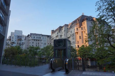 Photo for Paris, France - April 2022 - Recent apartment buildings in the 13th arrondissement's "Chinatown", one of the capital's main Asian quarters, with an elevator to go down to the Olympiades Esplanade - Royalty Free Image